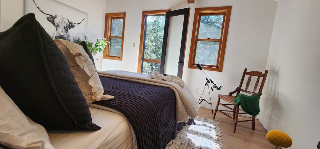 bedroom with telescope